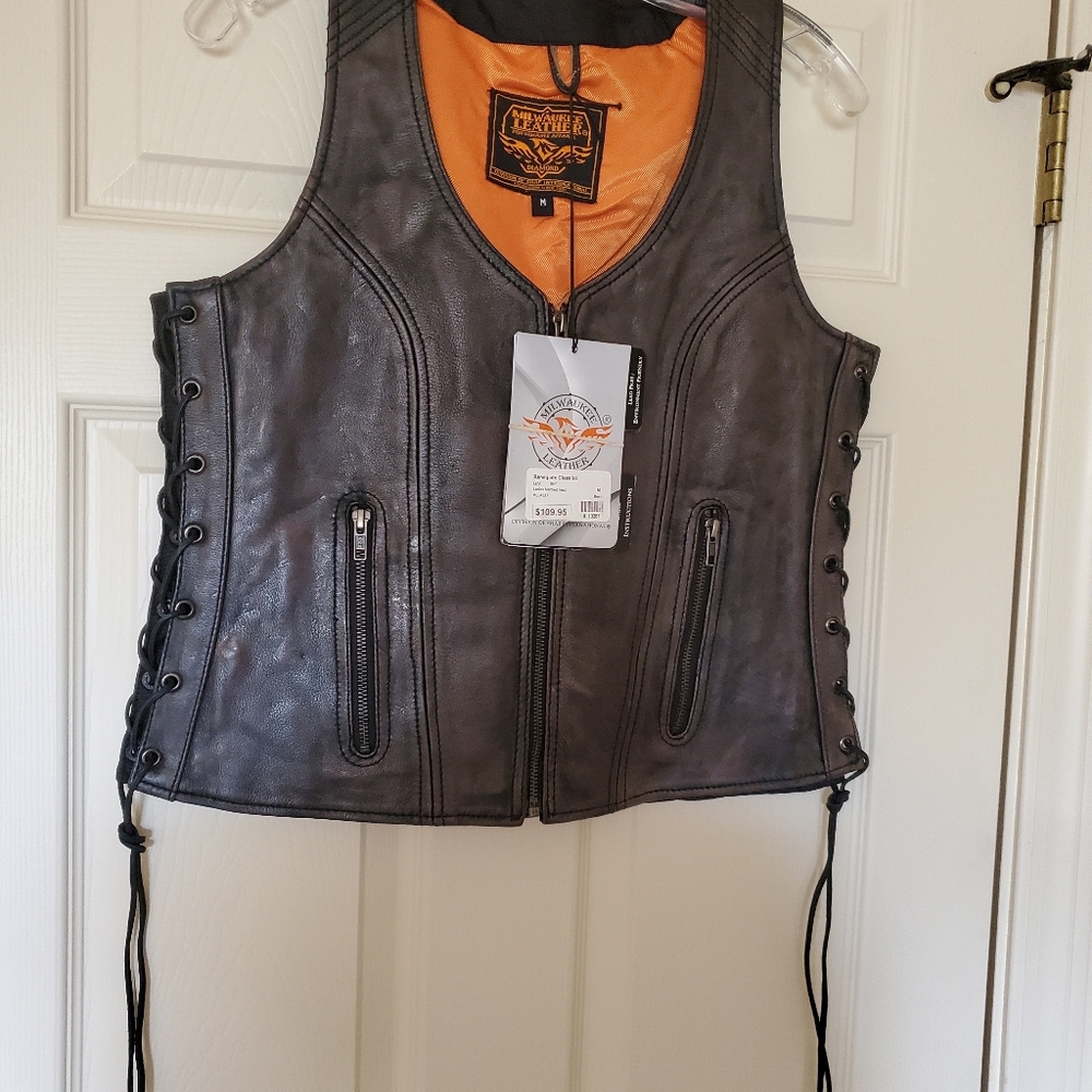 Leather vest. New never worn. Dark brown.